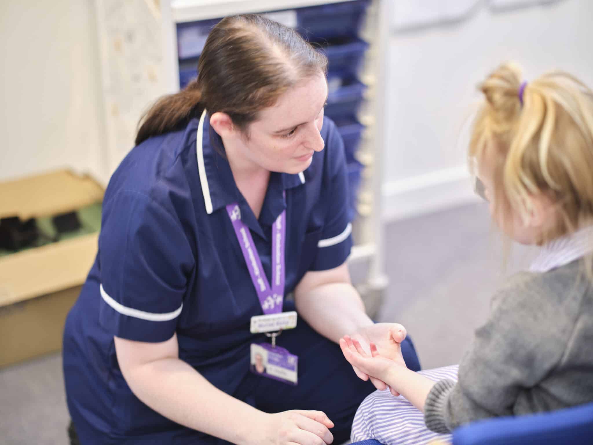 School nurse caring for Prep School child